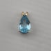 Vintage 4 carat pear shape, topaz pendant, 14 karat yellow gold