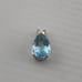 Vintage 4 carat pear shape, topaz pendant, 14 karat yellow gold