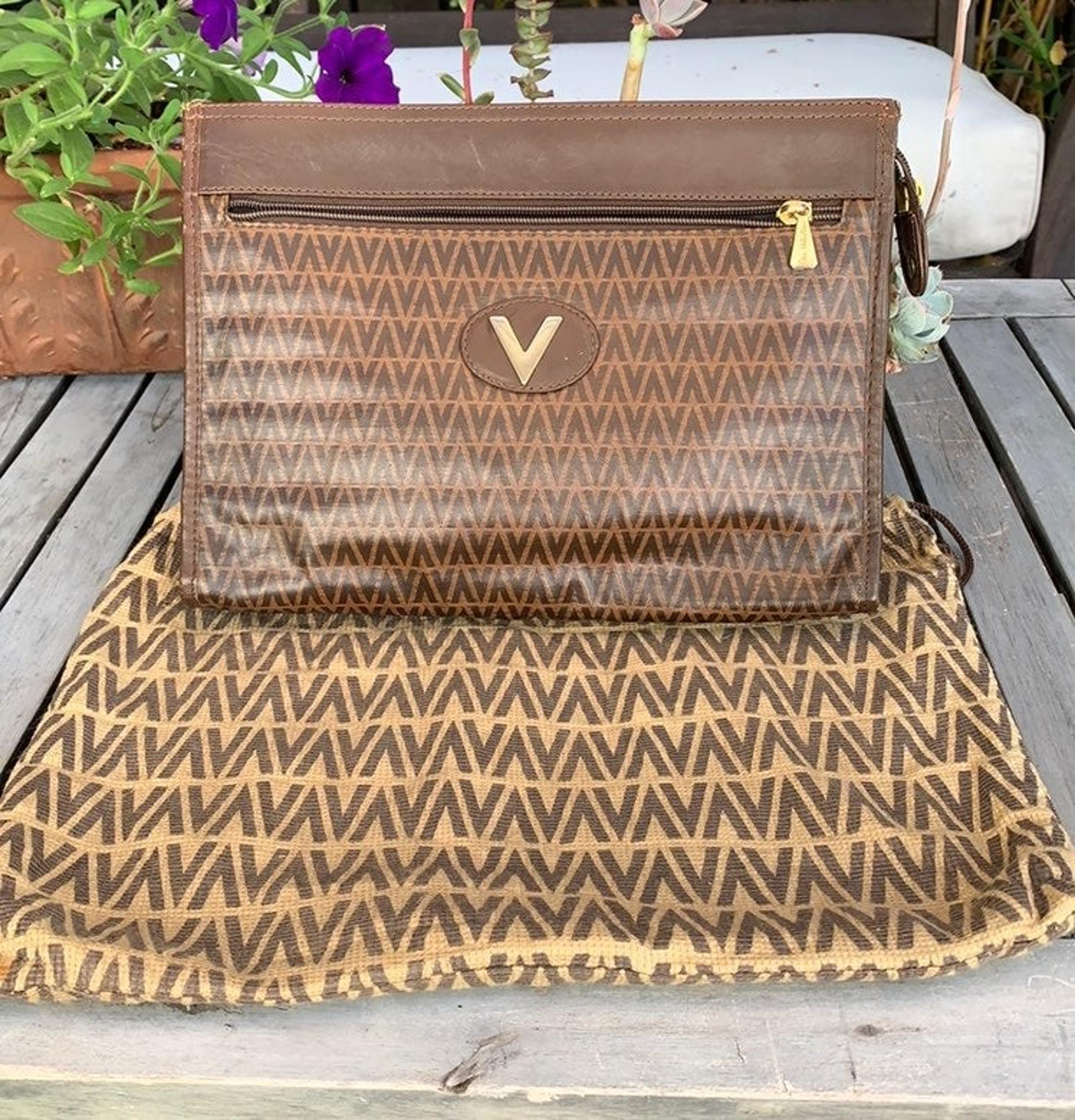 Mario Valentino zippered clutch