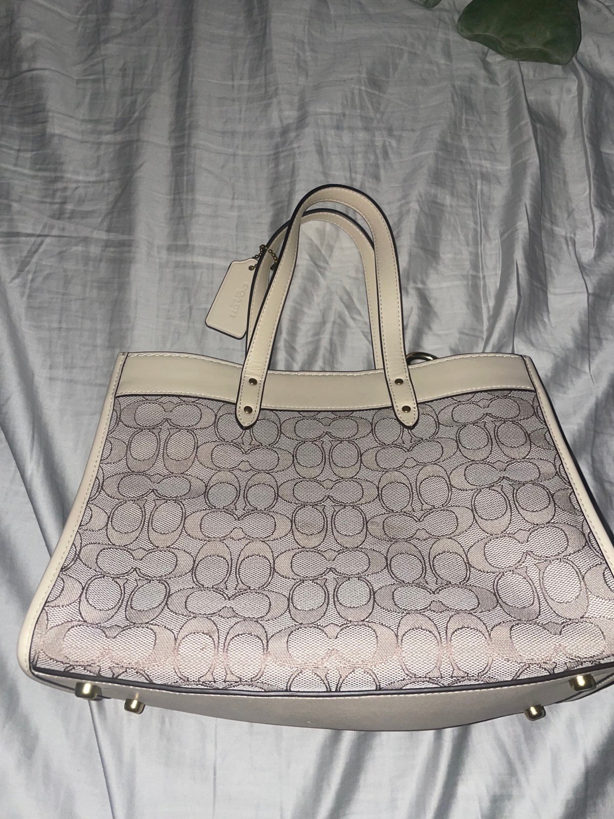 A brand new Coach purse.