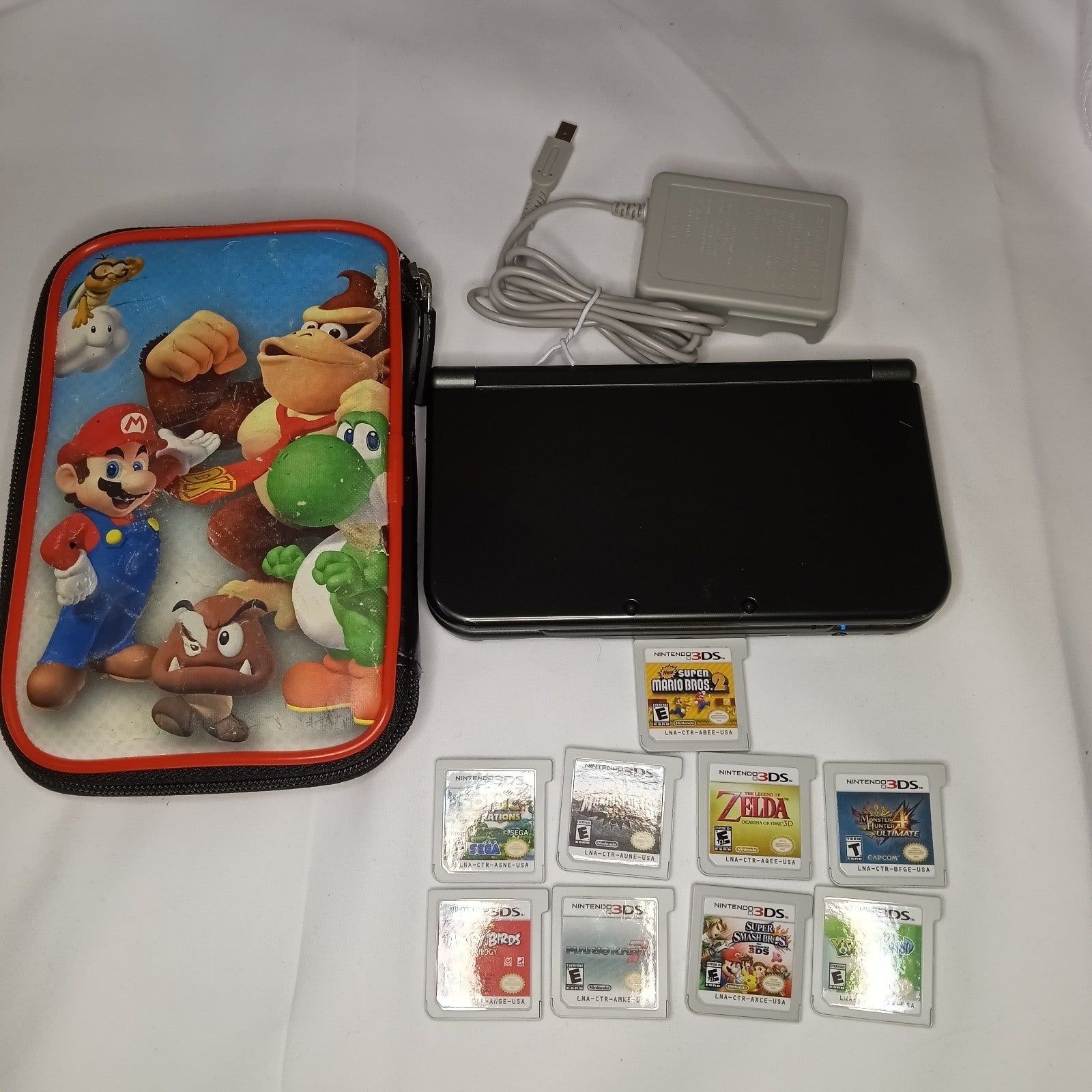 Nintendo New 3DS XL, Black, Charger, 9 Game Cards.