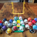 Lot of 26 Vintage 1973 NFL Mini Gumball Football Helmets with NFL Goal Post