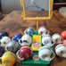 Lot of 26 Vintage 1973 NFL Mini Gumball Football Helmets with NFL Goal Post