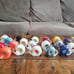 Lot of 26 Vintage 1973 NFL Mini Gumball Football Helmets with NFL Goal Post