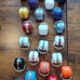 Lot of 26 Vintage 1973 NFL Mini Gumball Football Helmets with NFL Goal Post
