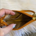 Orange Coach Wristlet