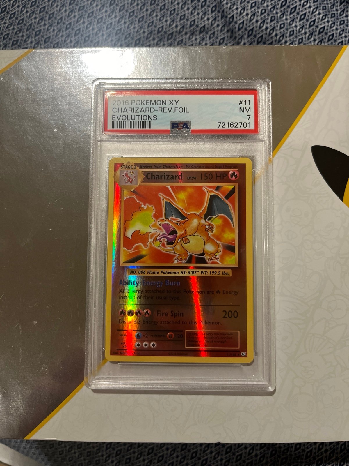 Charizard Evolutions XY Reverse Holo PSA 7