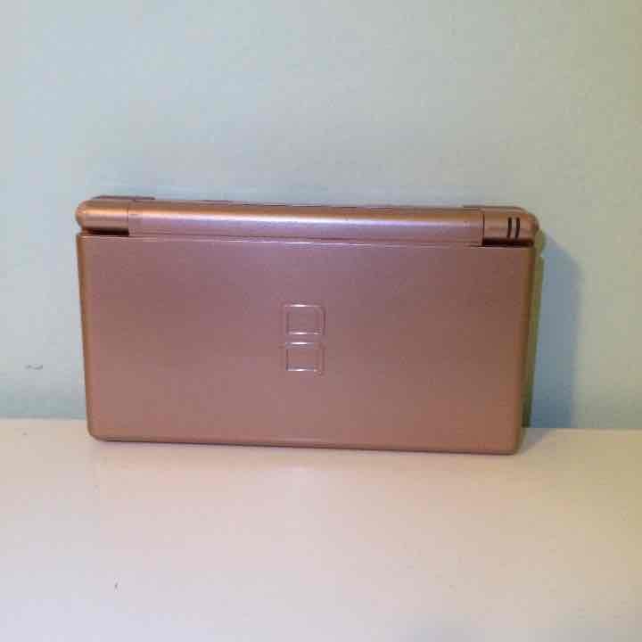 Pink Nintendo DS Lite with 4 games