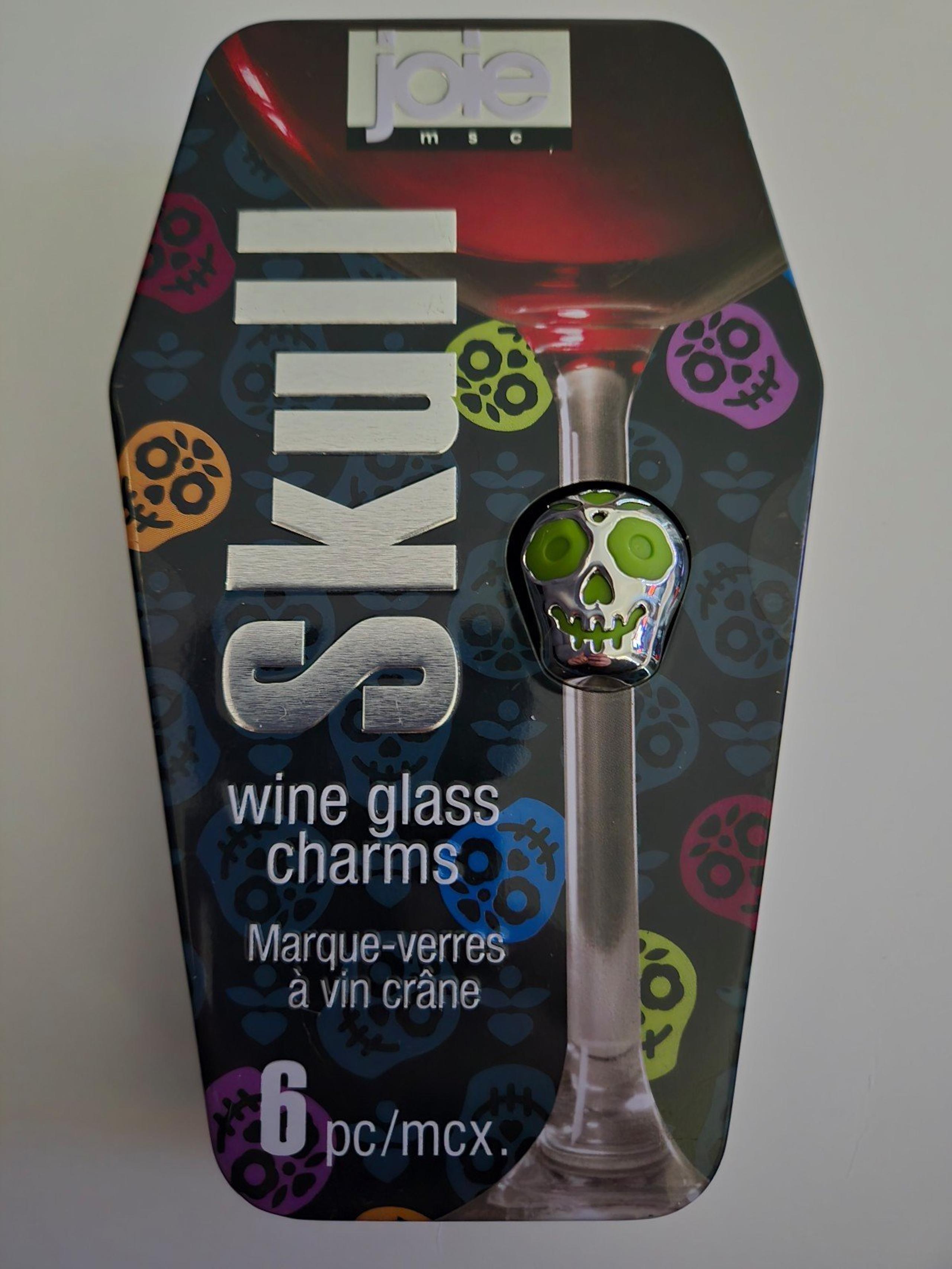 Joie set of 6 skull wine glass charms in tin coffin case like new price firm