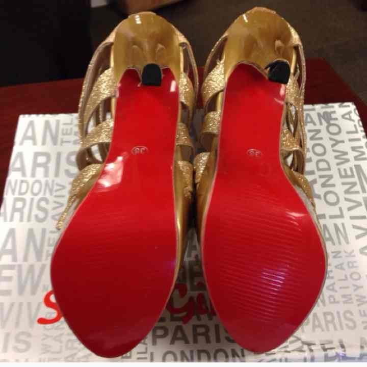 Gold sparkling red bottom heels