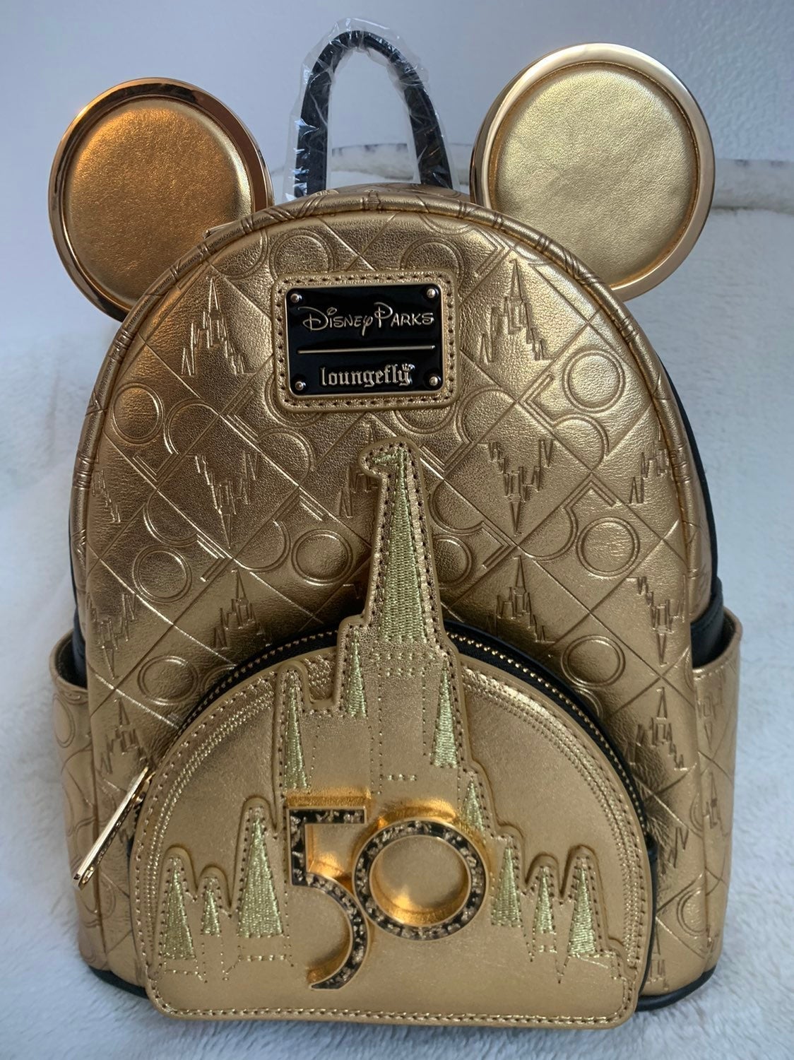 Gold loungefly mini backpack