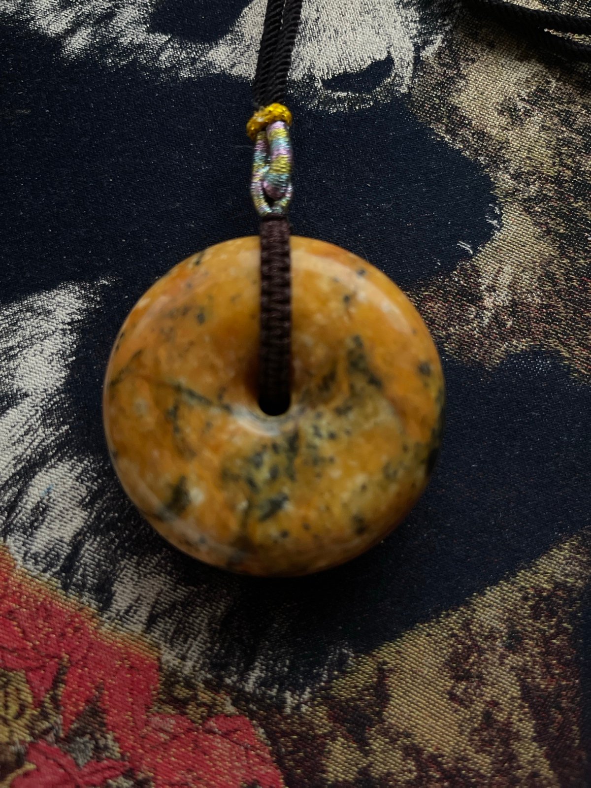 Burma Jade donut /disc pendant orange/black