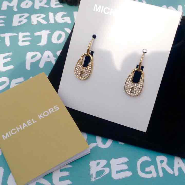 MK Earrings.