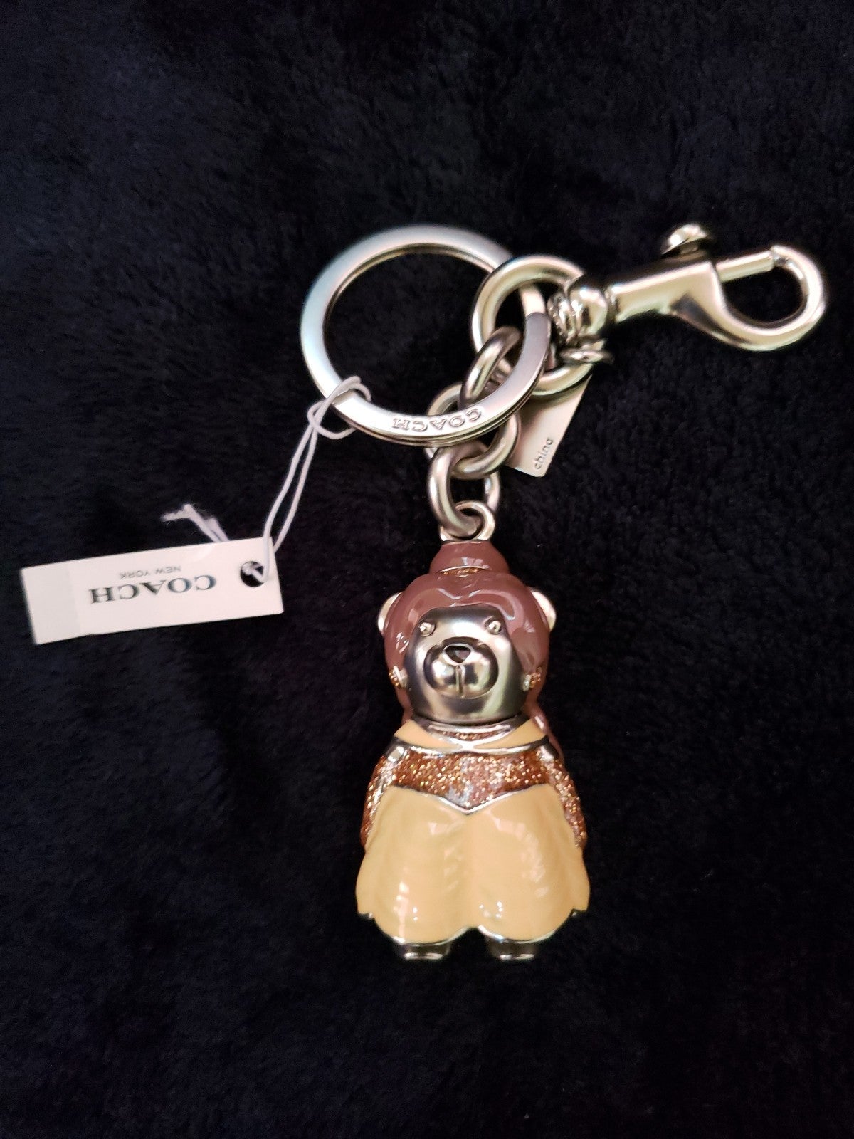 Coach x disney Belle keychain