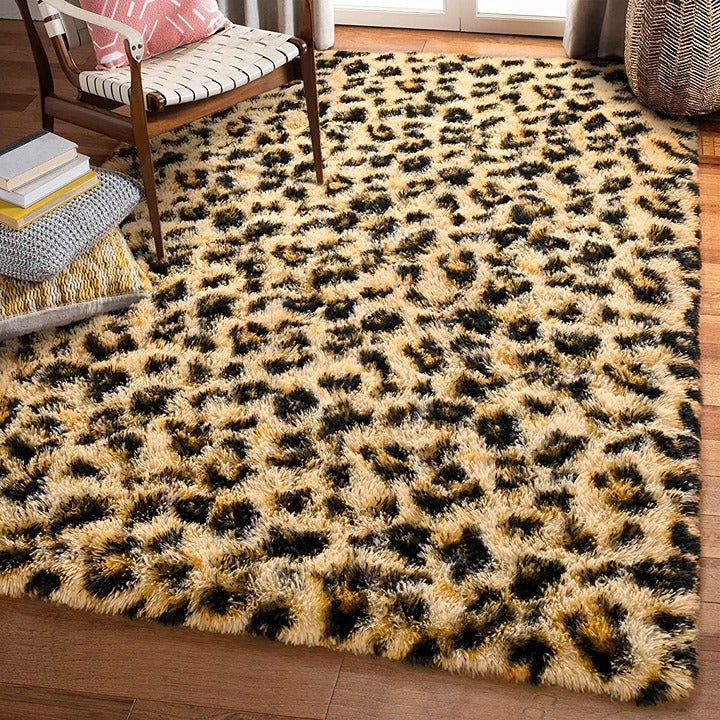 A premium cheetah print furry rug