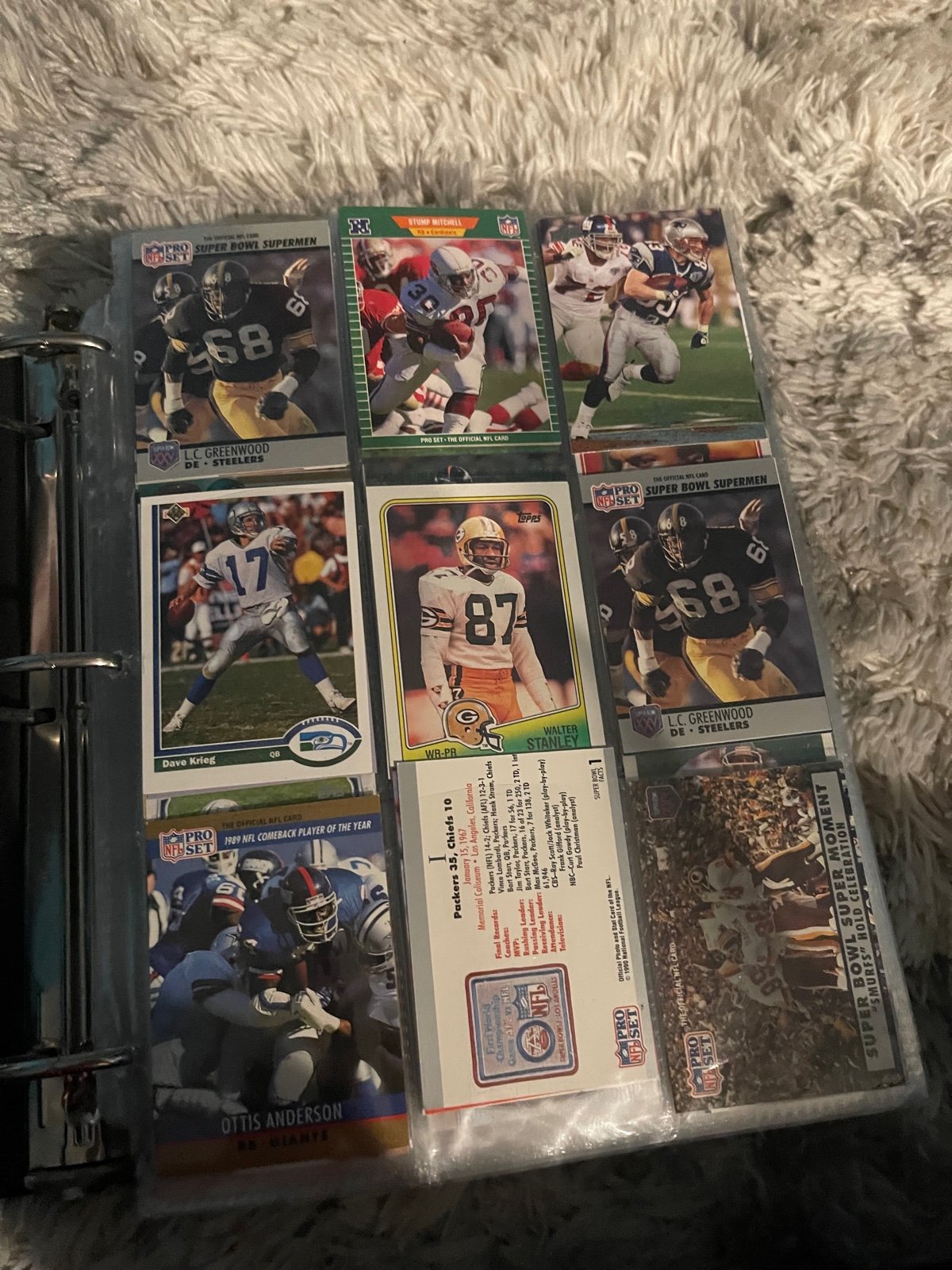 Bunch of Pokémon cards and football cards
