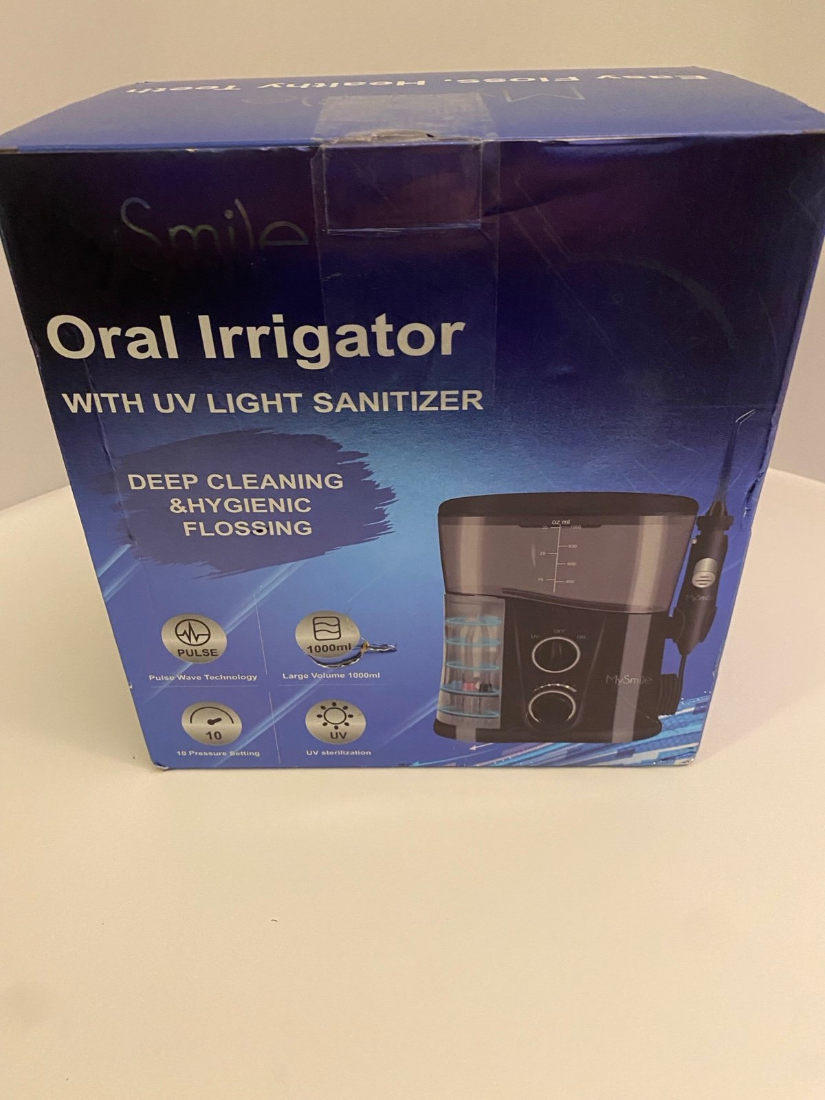 My smile, oral irrigator with UV sanitizer