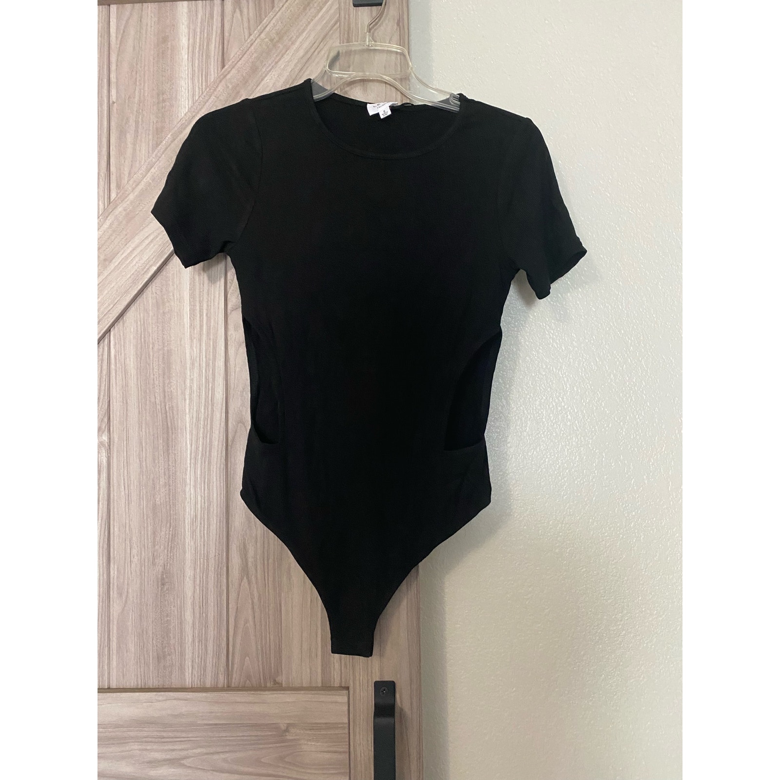 NWT Le Lis Black short sleeve bodysuit cutout size small