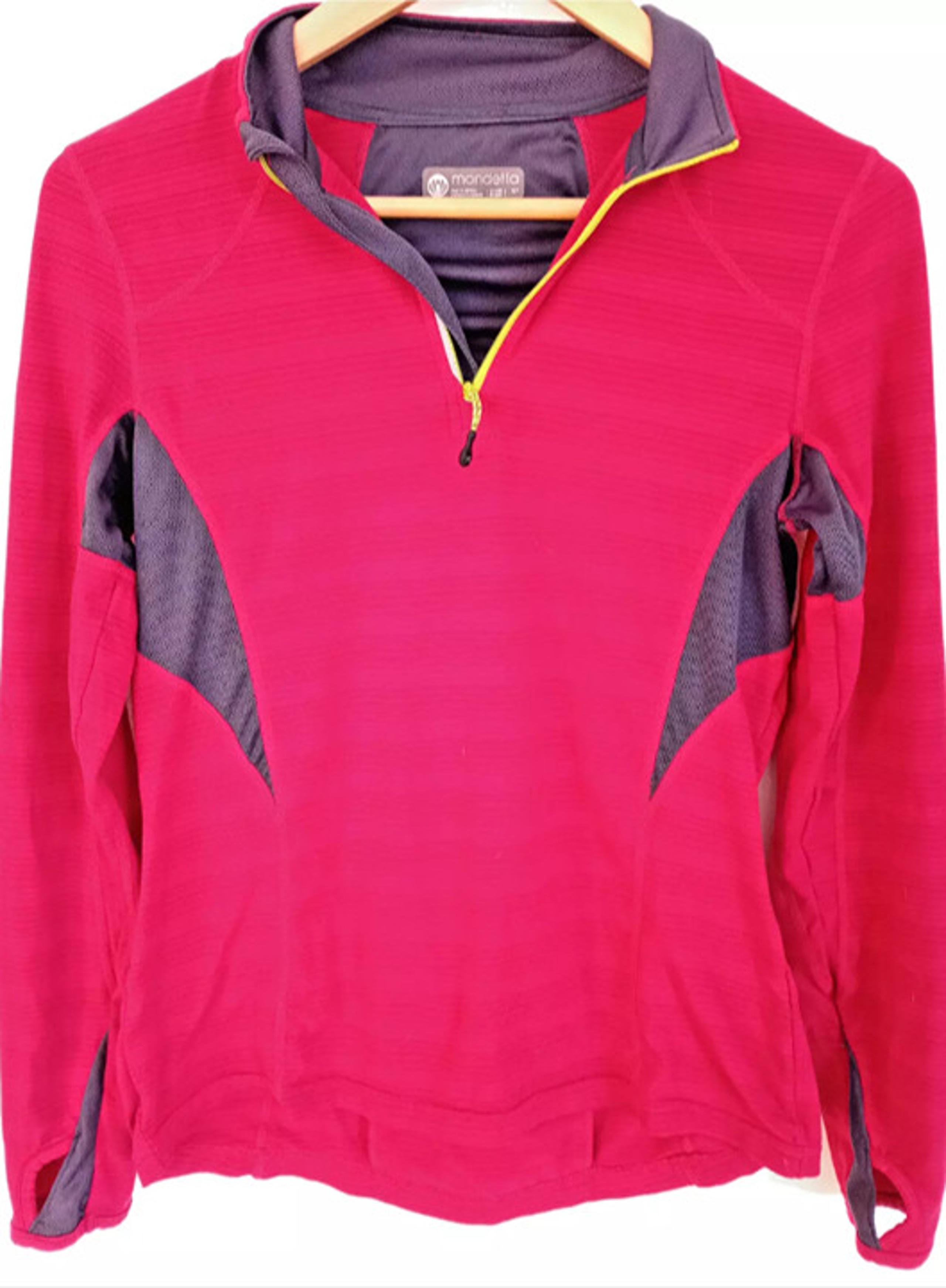 This is a MONDETTA women's track jacket in size small, designed for activewear p
