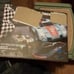 Two Slot car track with three new slot cars 7 cars total two tracks