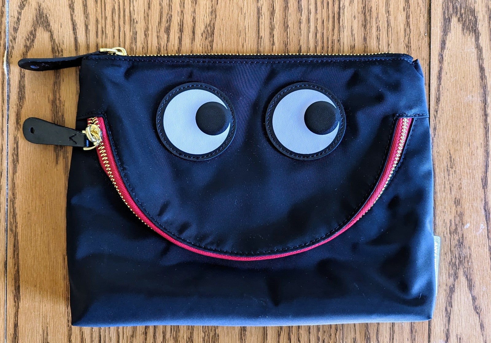 Anya Hindmarch happy eyes pouch.