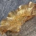 CARNIVAL GLASS GRAPE LEAVES RUFFLED EDGES MARIGOLD IRIDESCENT BOWL
