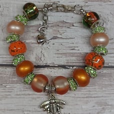 Orange Hand-Painted Glass Beads with Silver and Green Rhinestones and Bee Charm