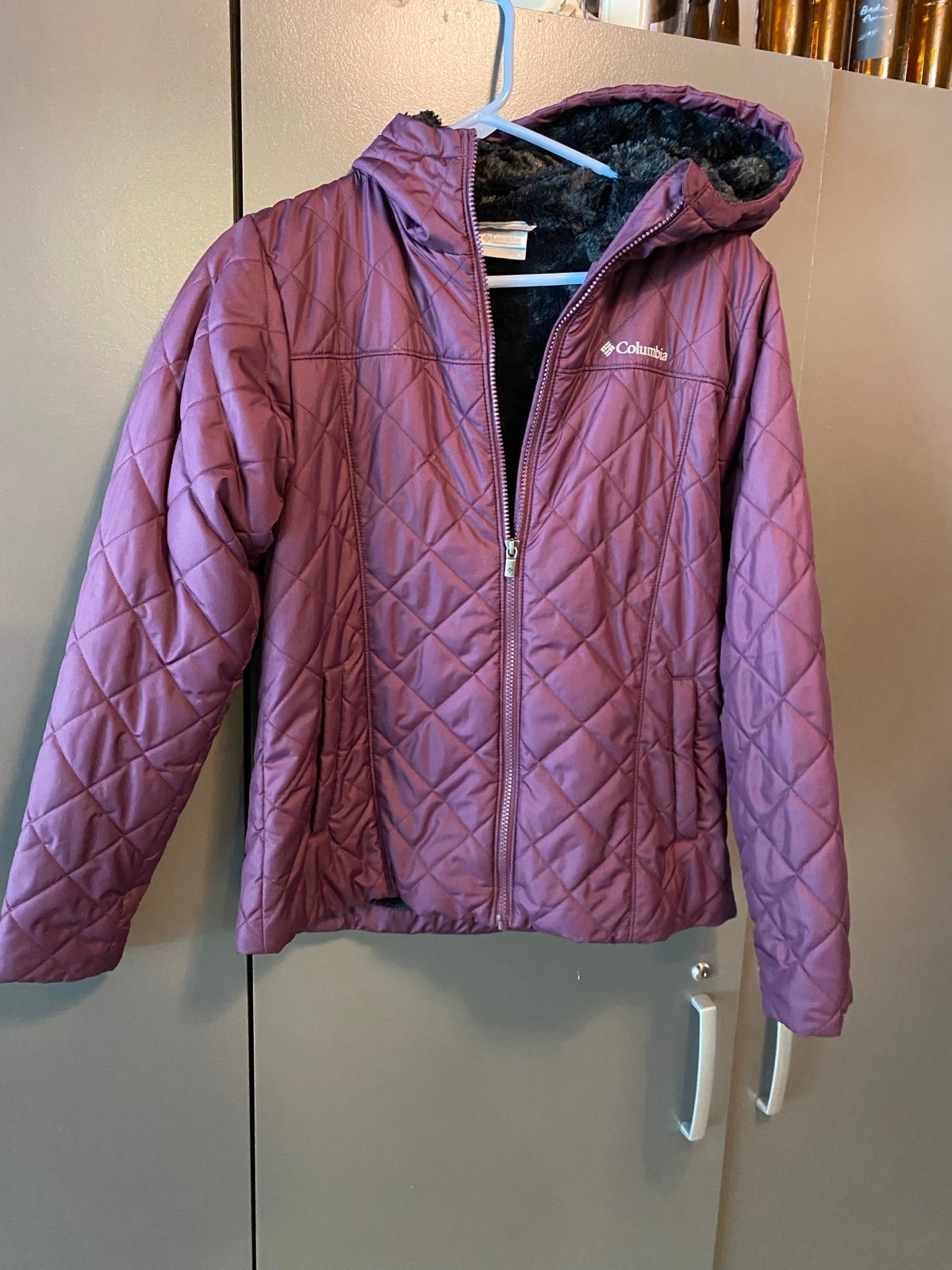Women’s Columbia, medium fur-lined, puffer jacket with hood in ex cond