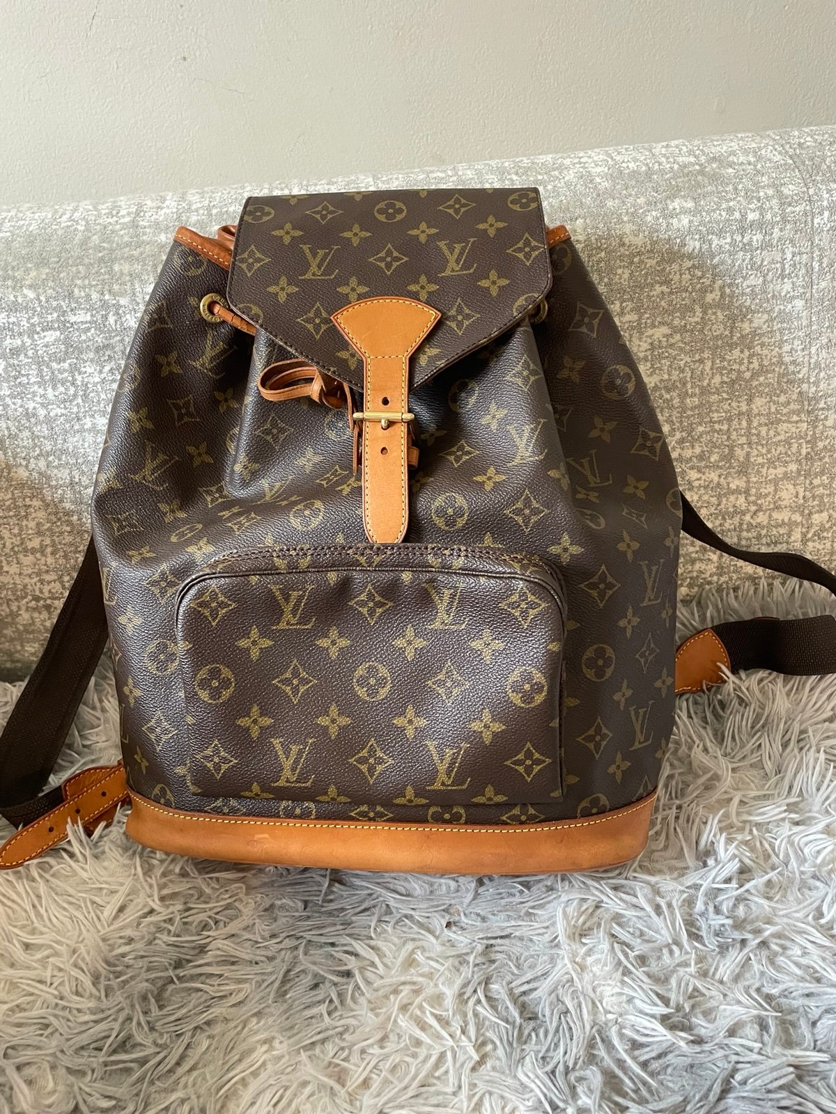 Pre, love authentic Louis Vuitton backpack has side of wear and tear