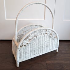 White wicker magazine rack basket