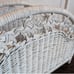 White wicker magazine rack basket