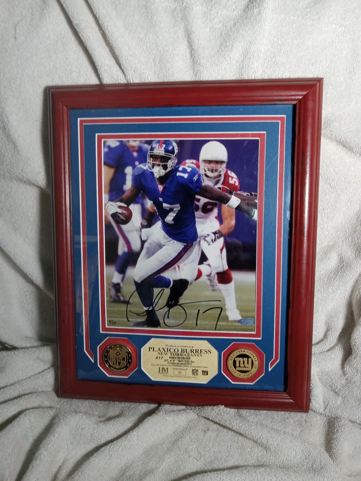 NFL Plaxico Burress Signed 8 x 10 framed.