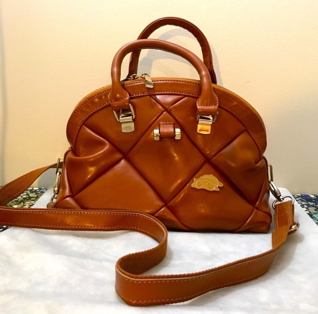 Cameral brown leather top handle bag with strap
