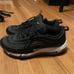 Womens Nike Air Max 97 trainers in black and white