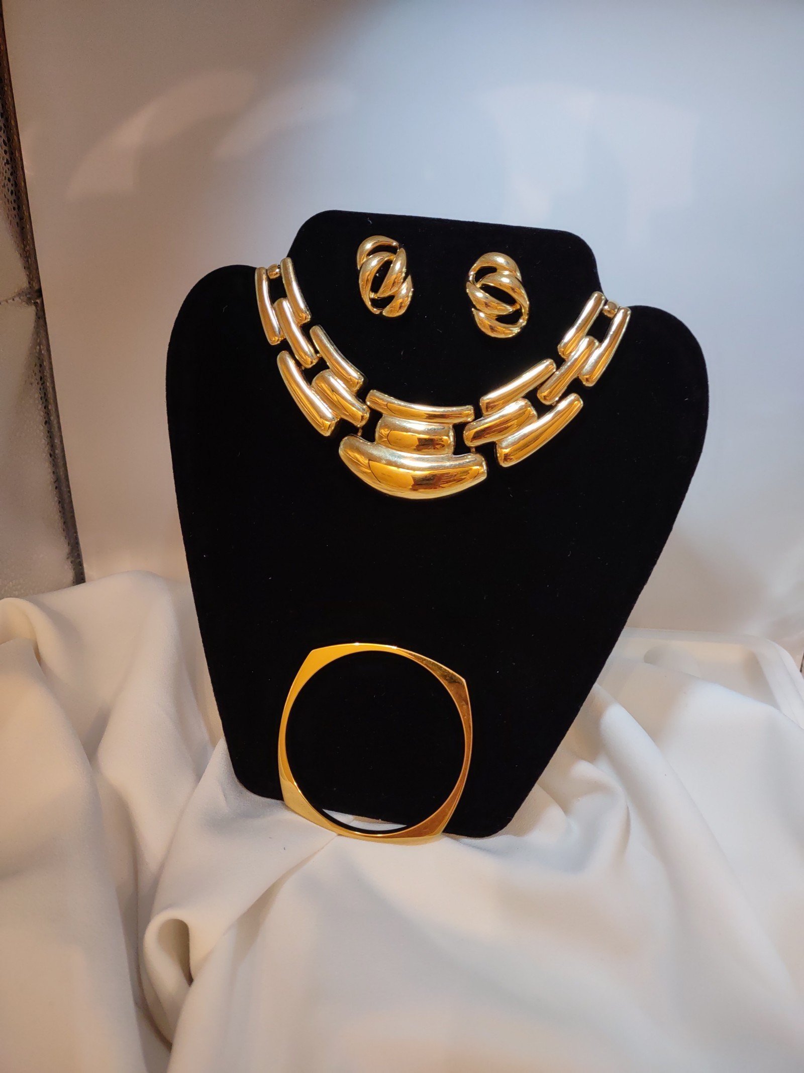 Vintage signed Napier gold-tone pierced earrings, bracelet and pendant