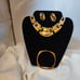 Vintage signed Napier gold-tone pierced earrings, bracelet and pendant