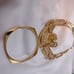 Vintage signed Napier gold-tone pierced earrings, bracelet and pendant