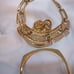 Vintage signed Napier gold-tone pierced earrings, bracelet and pendant