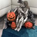 Skeleton Couple On Bench With Pumpkins