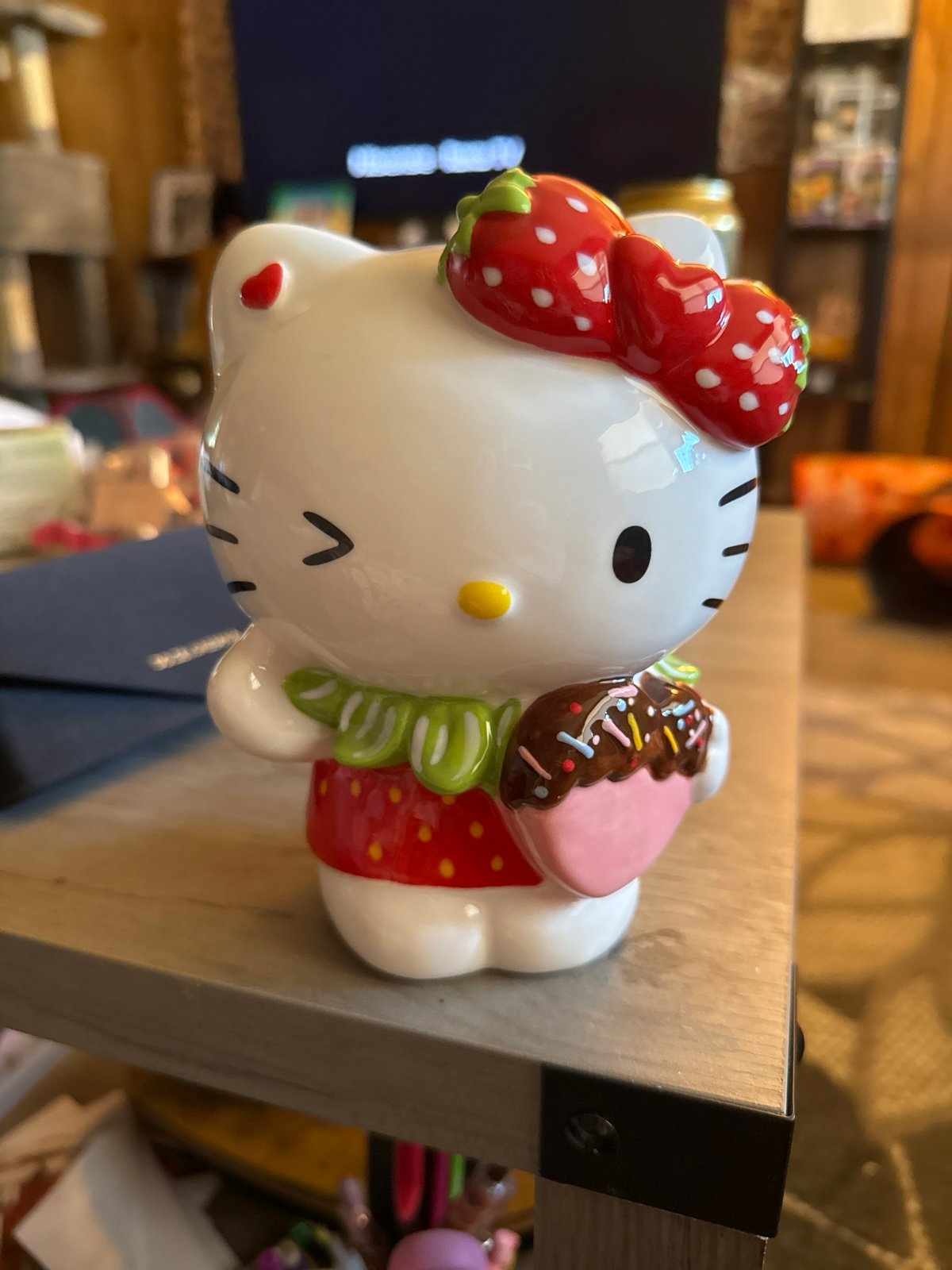 Hello Kitty chocolate strawberry blue sky ceramic figurine