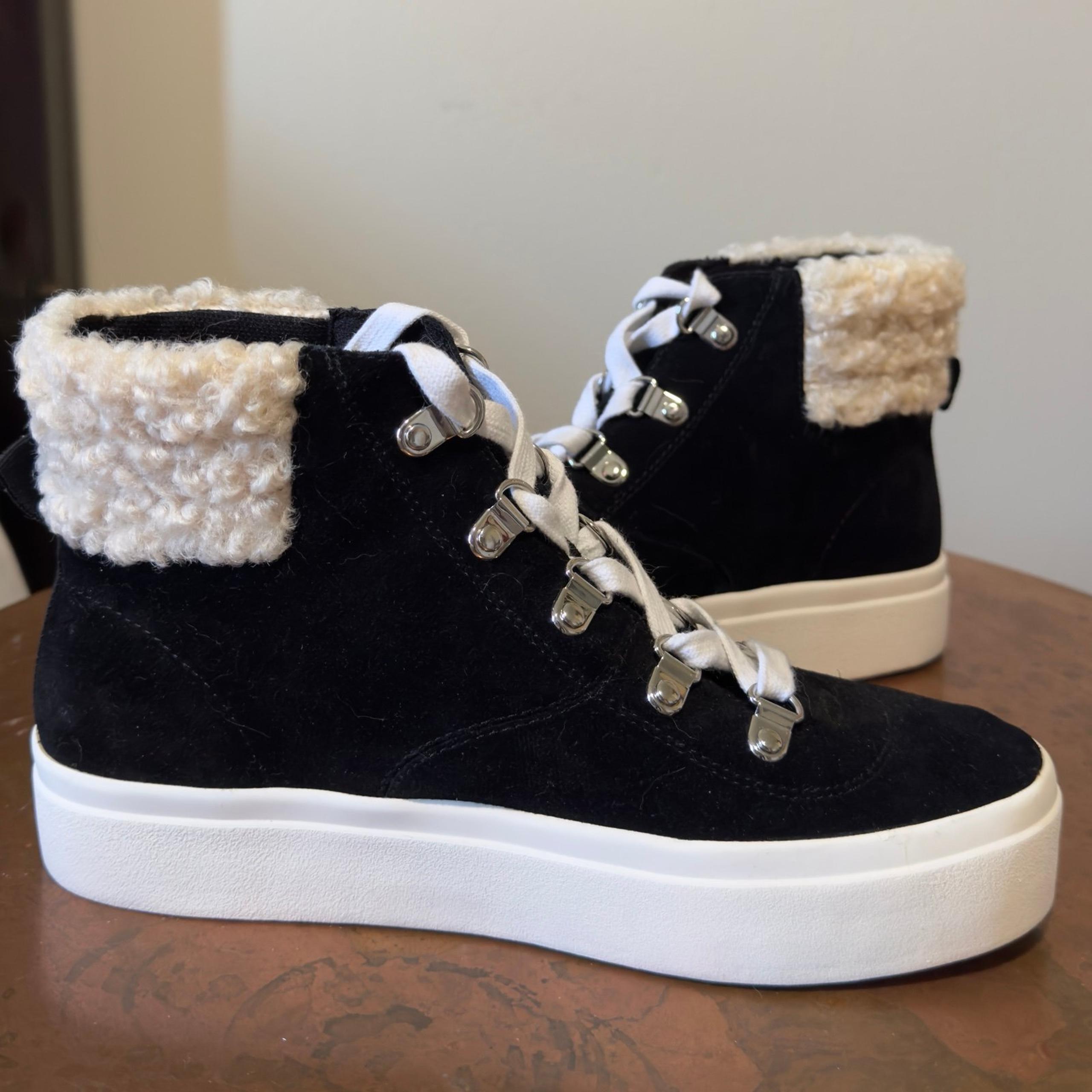 Sole Society Black Suede leather with cream color faux fur trim. Lace up. Size 6