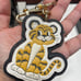 COACH LUNAR NEW YEAR TIGER BAG CHARM IN SIGNATURE CANVAS