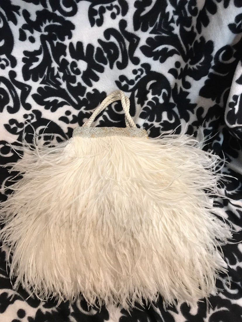 100 year old ostrich feather purse