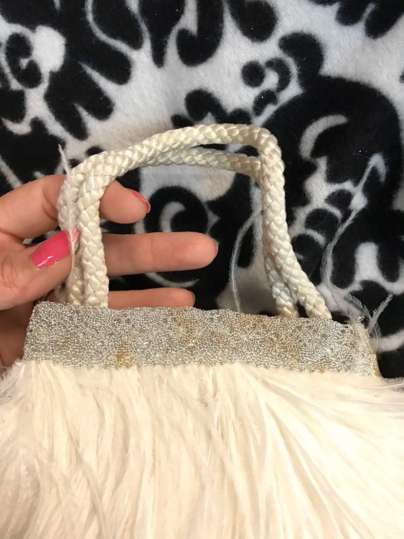 100 year old ostrich feather purse