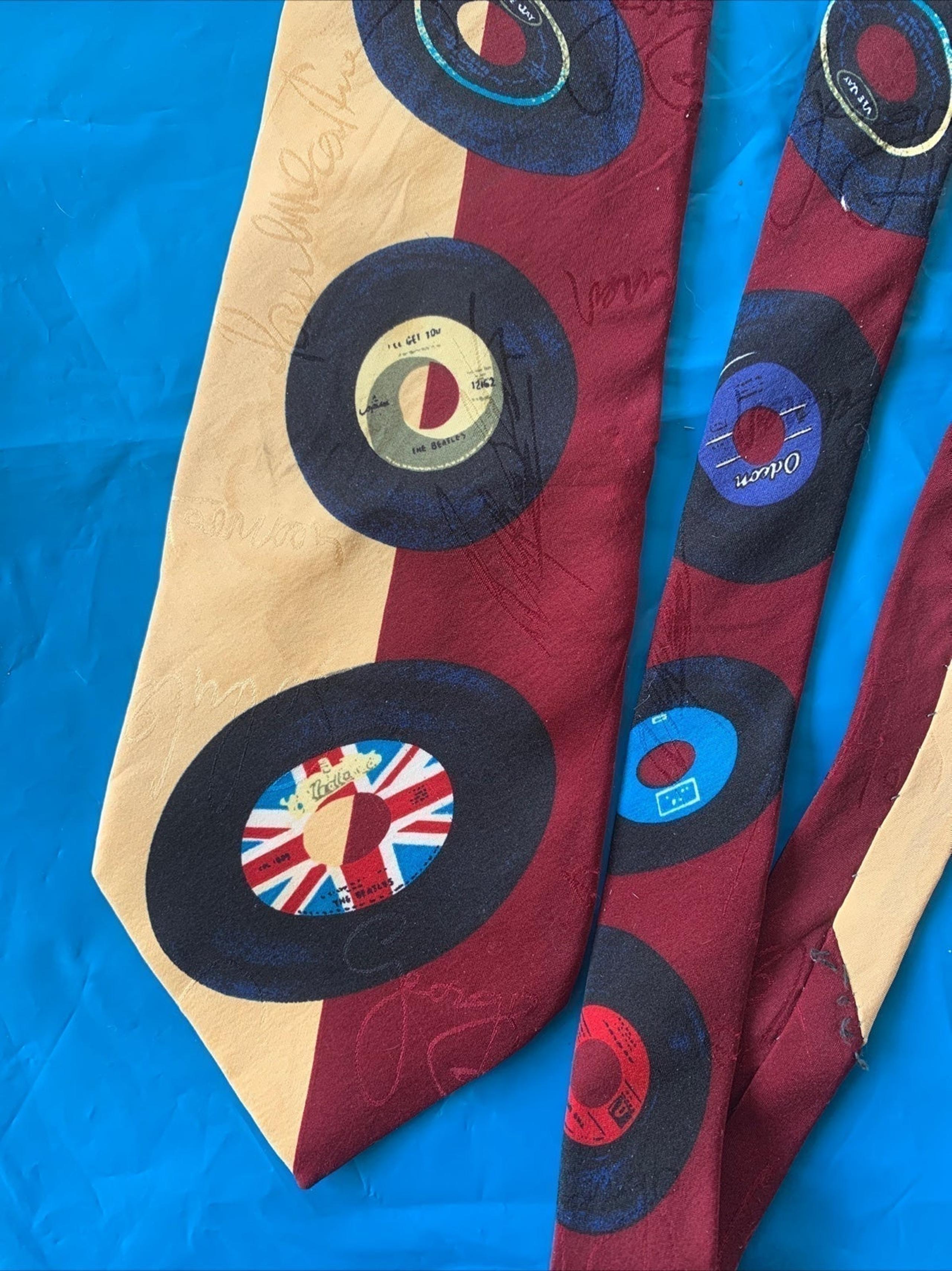 Beatles collection Retrospective 45s Necktie signed on back.Handmade