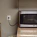 Microwave 950 watts GE 2 years old clean black and stainless steel.