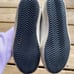 Woman’s golden goose shoes