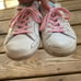 Woman’s golden goose shoes