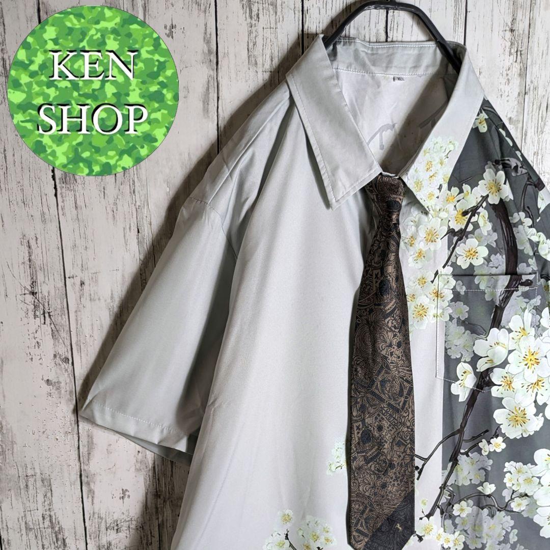 Light green floral patterned vintage shirt with tie.