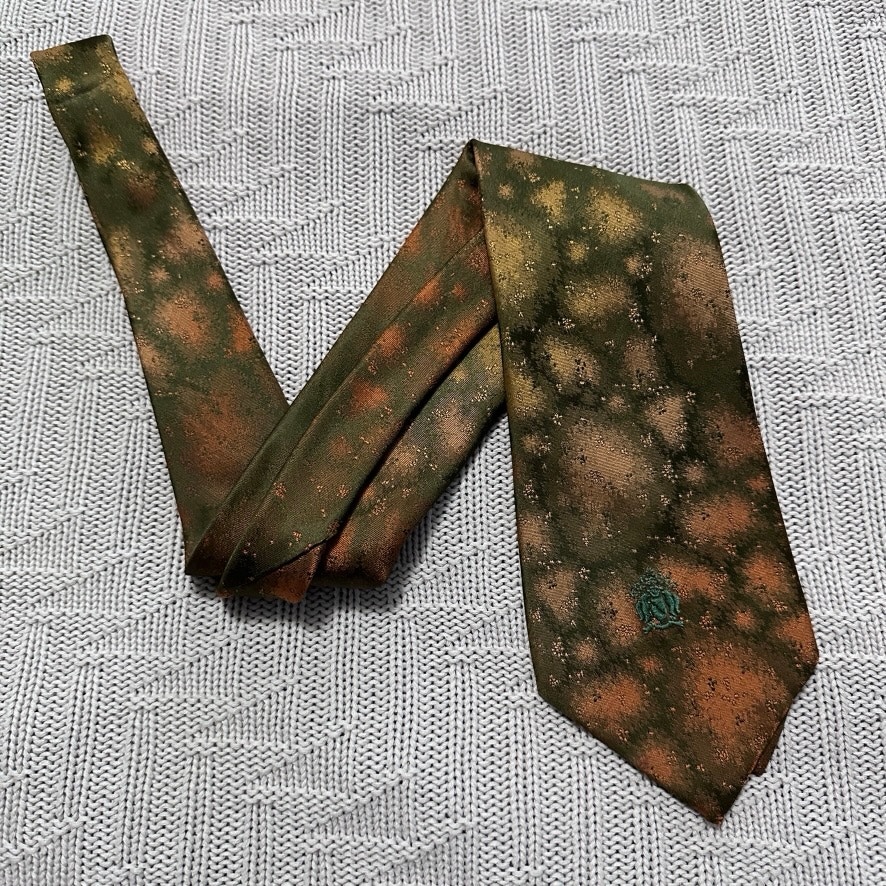 Vintage Oleg Cassini green and bronze starburst abstract tie
